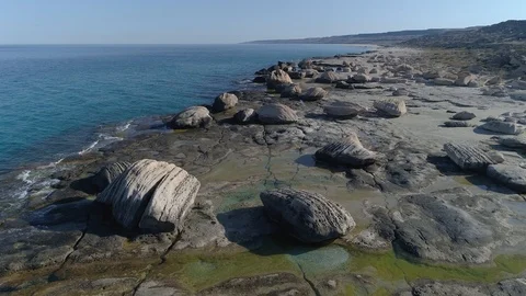 Span of the Copter. Beach with large boulders. Stock Footage 94228718