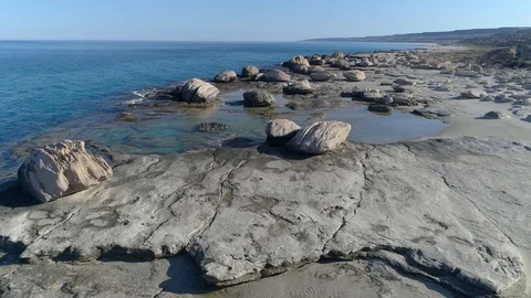 Span of the Copter. Beach with large boulders. Stock Footage 94229429