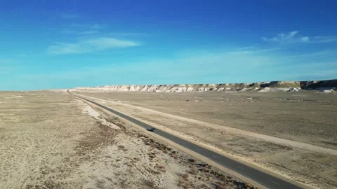 The span in front of the car driving against the background of mountains and Stock Footage 238462602