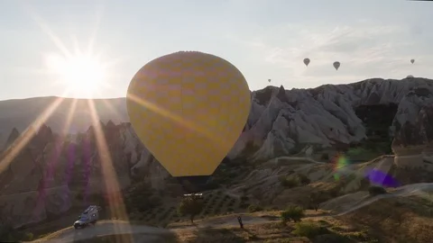 The span of a large yellow balloon, in a basket of people, close-up. Cappadocia Stock Footage 105516649