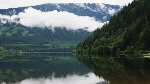 Span over mountain, tree, lake and road Stock Footage 250135100