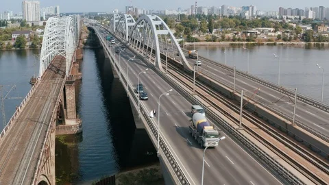 Span over the railway bridge in Kiev. On the bridge is the bride and groom. Stock Footage 120397604