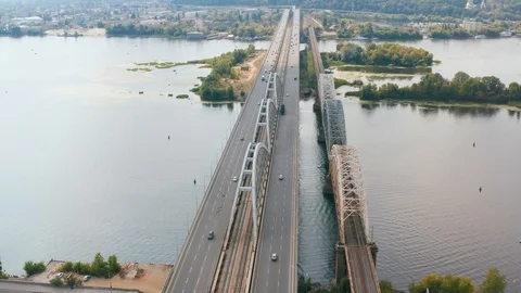 Span over the railway bridge in Kiev. On the bridge is the bride and groom. Stock Footage 120397703