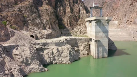 The span of a small dam at the reservoir Stock Footage 210187479