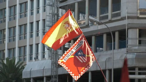Spanish and Atletico Madrid flags wave in the crowd during celebrations for Stock Footage 340921794