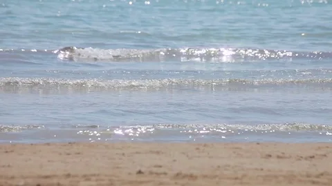 Spanish beaches in Catalonia. Sea surf, waves and sunlight glare. Stock Footage 75582653