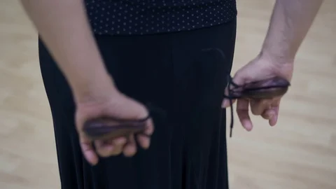Spanish castanets in the hands Stock Footage 91716401