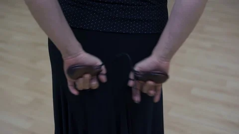 Spanish castanets in the hands Stock Footage 91716403