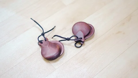 Spanish castanets in the hands Stock-Footage 91716487