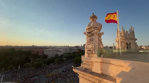 Spanish flag waving over Madrid Gay Pride parade Stock Footage 341374575