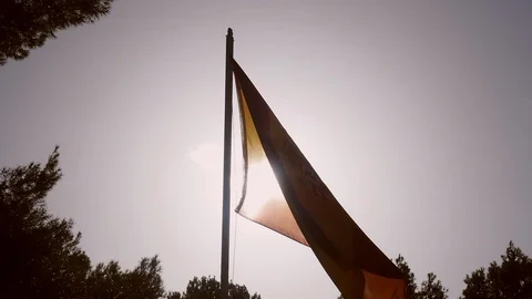 Spanish Flag in Wind Through Sun Light Slow Motion Stock-Footage 99352177