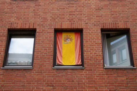 Spanish flag in window Stock Photos