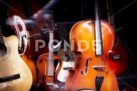 Spanish guitar and cello Stock Photos