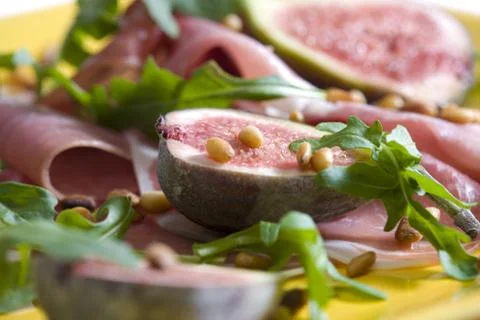 Spanish ham with figs and pine nuts Foto stock