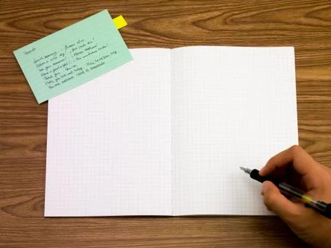 Spanish; Learning New Language Writing Words on the Notebook Stock Photos