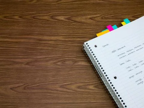 Spanish; Learning New Language Writing Words on the Notebook Stock Photos