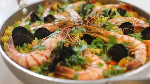 Spanish paella dish presentation slide panorama close up Stock Footage 123118003