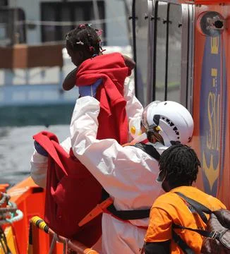 Spanish Salvamento Maritimo rescues 45 SubSaharian migrants in Gran Canaria, Arg Stock Photos