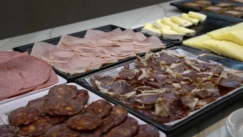 Spanish tapas buffet with ham cheese sausage and cold cuts Stock Footage 341809766