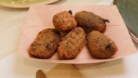Spanish tapas concept, octopus fried croquettes. Stock Footage 308033112