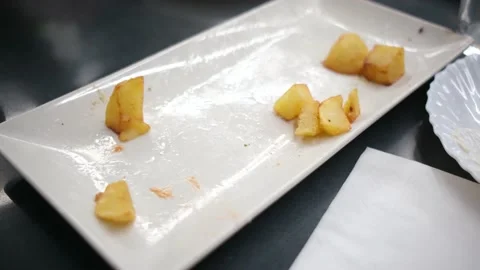 Spanish tapas seafood fish potatoes tortilla hands children family eating Stock Footage 235608545