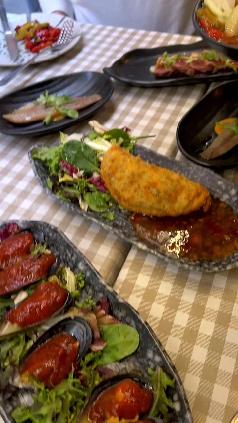 Spanish tapas served in typical restaurant of Malaga. Stock Footage 278243251
