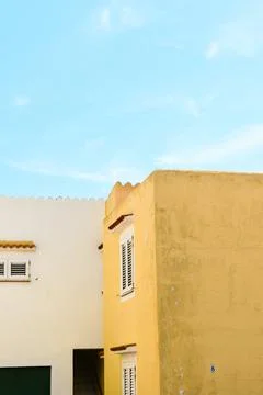 Spanish villa with bluse sky backgound painted in authentic traditional colou Stock Photos