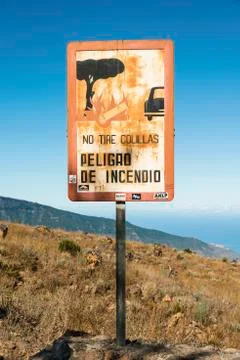 Spanish warning sign warning of forest fires No tire colillas   Peligro de Stock Photos