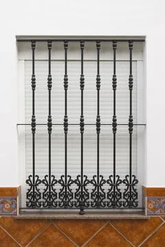 Spanish Window With Security Grill Stock Photos