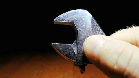Spanner and male hands in work close up. 4K shot 库存影片 61793153