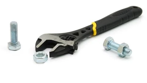 Spanner and Nuts and Screw on a white background Stock Photos