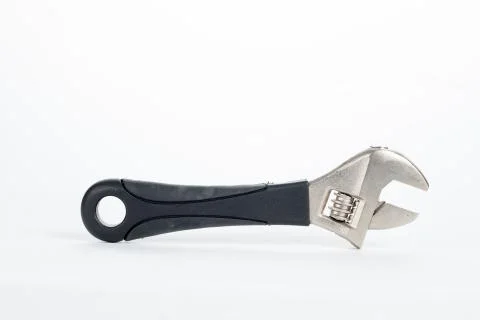 A spanner with black rubber handle isolated on white background Stock Photos