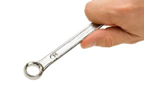 Spanner in hand Stock-Fotos