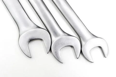 Spanner Set Isolated. Silver coloured spanners lying side Foto stock