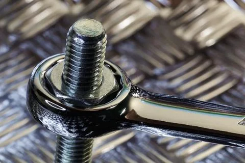 Spanner Tightening Hex Nut To Threaded Bolt Stock Photos