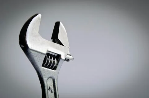 Spanner / wrench on grey Stock Photos