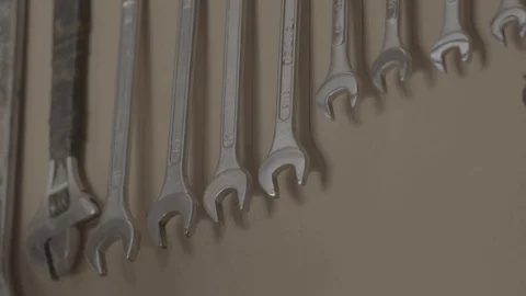 Spanners hanging on a wall 스톡 동영상 73892203
