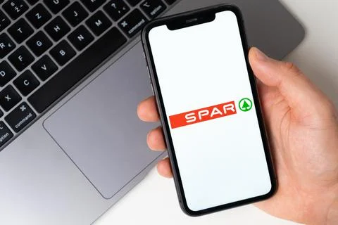 Spar mobile application of grocery chains. A mobile app for paying and ordering Stock Photos