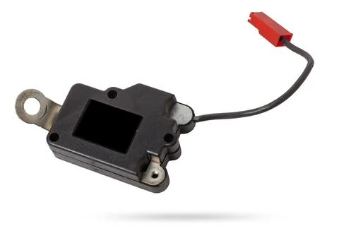A spare part for a plastic car engine control unit in black with red elemen.. Foto stock