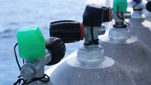 Spare scuba tanks lined up on dive boat Stock Footage 87373512