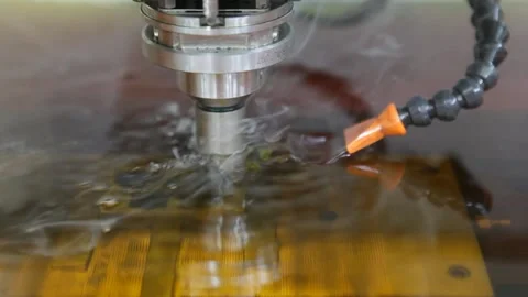 Spark erosion machine in operation sculpting a piece of metal.  Stock Footage 247971979