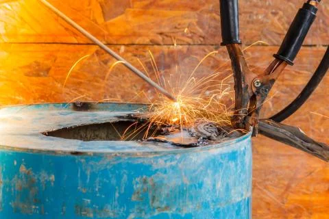 Spark light with welding Process with blue tube metal and bright sparks in st Stock Photos