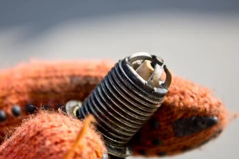 Spark plug in hand Stock Photos