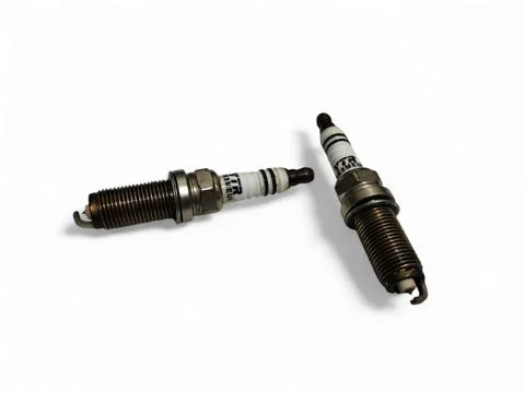 Spark plug isolated on white background Stock Photos