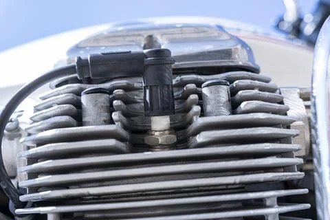 Spark plug in the motorcycle engine and the ignition wire Fotos de archivo
