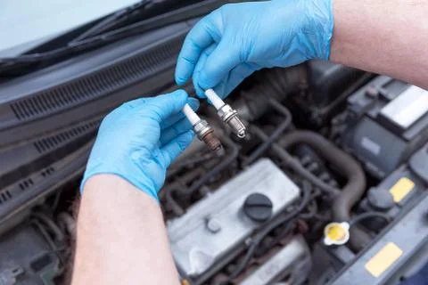 Spark plug, old and new Foto stock