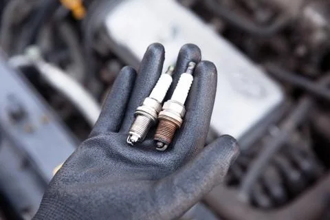 Spark plug, old and new Stock Photos