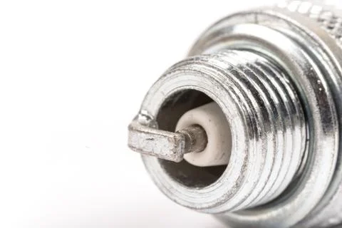 Spark plug over white background with copy space Foto stock
