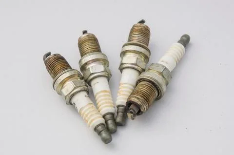 Spark plug plug combusion part mechanical concept Stock Photos