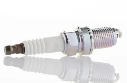 Spark-plug Spark-plug on white reflective background Copyright: xZoonar.co... Stock Photos